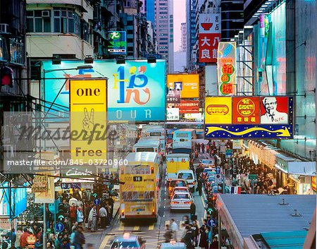 Hong Kong, Kowloon, evening traffic on Sai Yeung Choi Street in Mongkok.