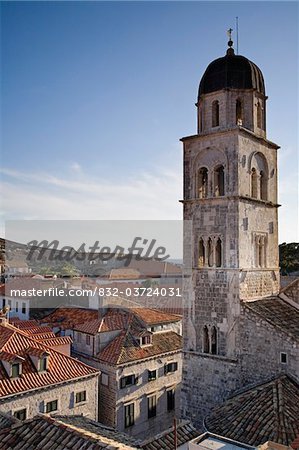 Tower of Saint Saviours church and rooftops.