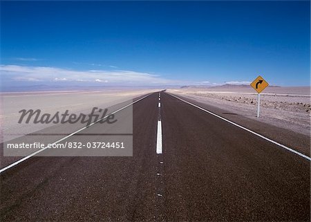Empty road through desert