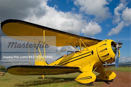 Kenya, Laikipia, Lewa Downs. Will Craig's 1930s style Waco Classic open cockpit bi-plane for the ultimate aerial safari.