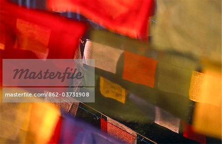 Prayer flags festoon the Stupa at Boudinath, a centre of Tibetan Buddhism, Kathmandu, Nepal