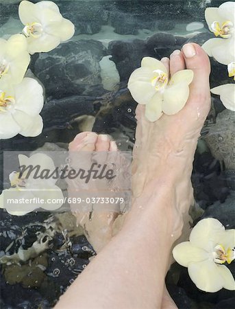 Woman taking footbath