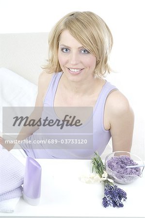 Woman next to lavender peeling