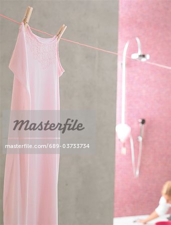 Pink nightdress on clothesline