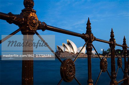 Australia, New South Wales, Sydney.  Dusk view of the Sydney Opera House from Dawes Point.