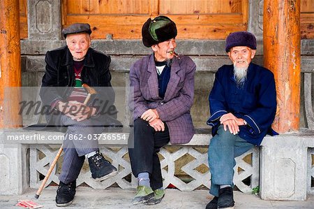 China, Guizhou Province, Taijiang, old men sitting down