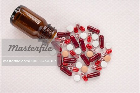 Bottle with Spilled Pills