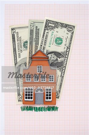 House and American Currency on Graph Paper
