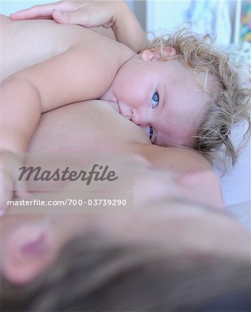 Woman Breastfeeding Toddler