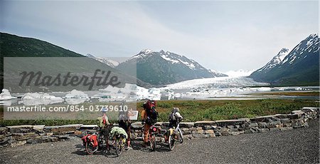 Group of bicyclists on the trail to Spencer Glacier, Chugach National Forest, Kenai Peninsula, Southcentral Alaska, Summer