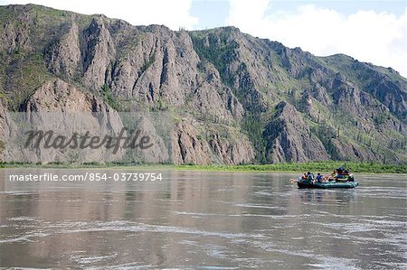 A Family floats down Yukon River in Yukon-Charley Rivers National Preserve  Interior Alaska, Summer