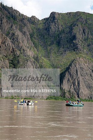 Two families float down Yukon River in Yukon-Charley Rivers National Preserve  Interior Alaska, Summer