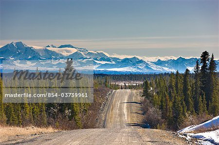 View of the Denali Highway looking east with the Alaska Range in the backgroundl, near Cantwell, Southcentral Alaska, Spring