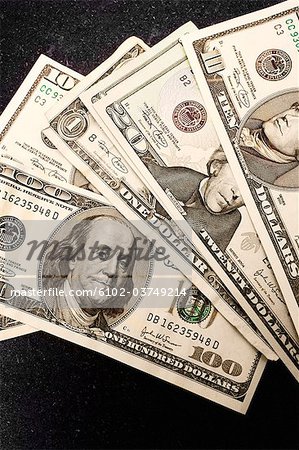 A pile of dollar bills, close-up.