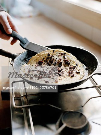 Making crepes with chocolate