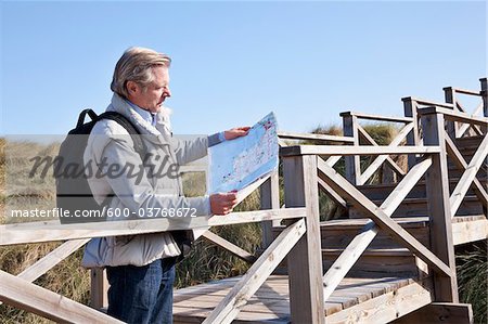 Man Reading Map, Cala Ratjada, Mallorca, Balearic Islands, Spain