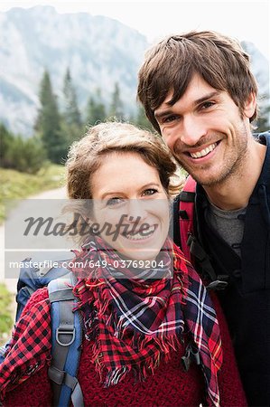 Couple with backpacks portrait