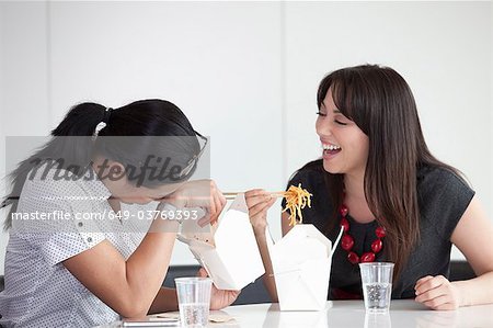 Girls laughing during lunch break