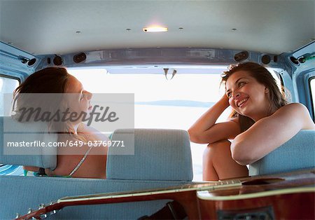 Women camping in back of car