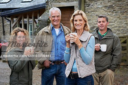 Family having tea on the farm