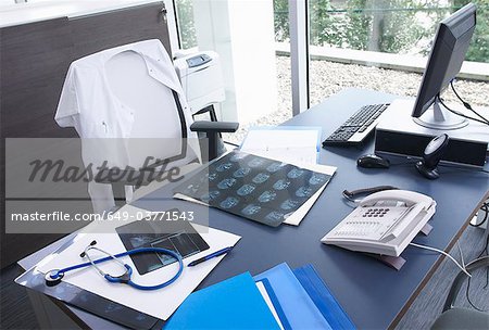 Doctor's desk, x-rays & stethoscope