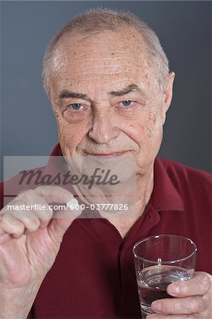 Man Taking Pill