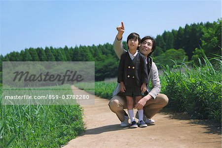 Boy with his Father in Park