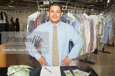 Man working in the laundrette