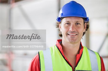 Smiling worker with hat