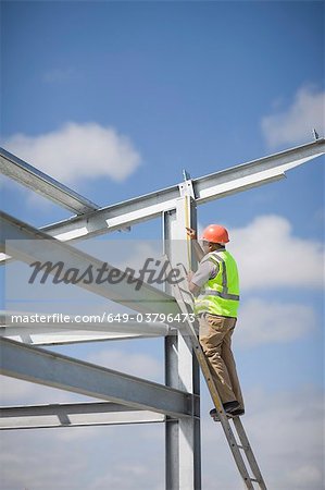 Worker inspecting a building plot