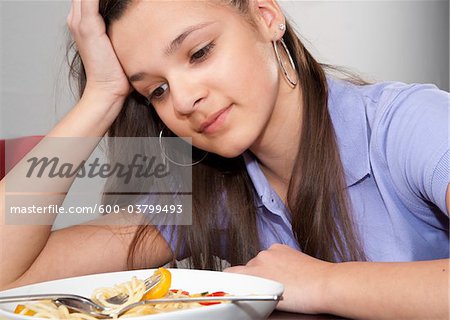 Girl Eating Pasta