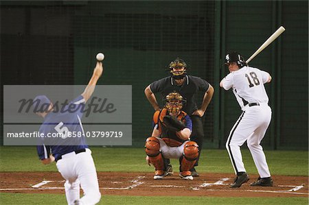 Baseball players playing game