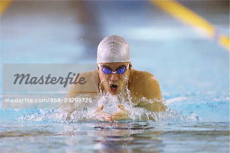 Athlete swimming breaststroke