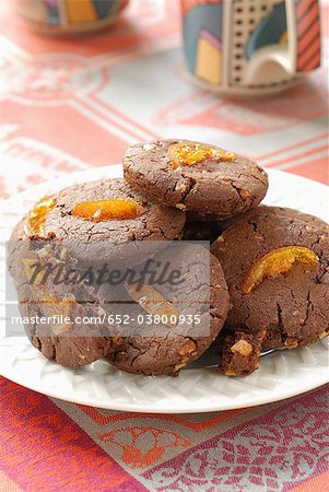 Chocolat, noix, gingembre et confit d'oranges biscuits
