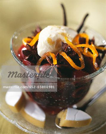 Stewed plums with star anise and ice cream