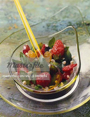 Strawberry fruit salad with basil and mint