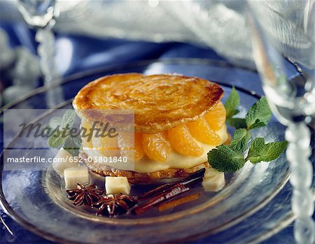 Crunchy mandarin dessert with exotic syrup