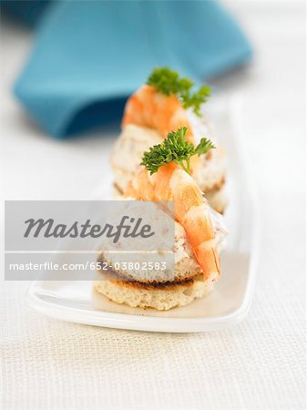 Tuna mousse and shrimp on a bite-size slice of bread