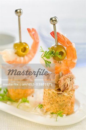 Tuna,shrimp and olive mini skewers