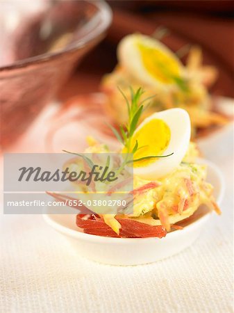 York ham,quail's egg,and red pepper tartlet York ham,quail's egg,and red pepper tartlet