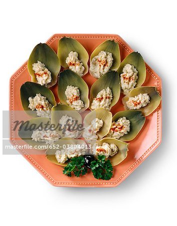 Artichoke leaves filled with mayonnaise