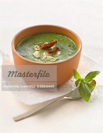 Cream of rocket soup with mozzarella and sun-dried tomatoes Cream of rocket soup with mozzarella and sun-dried tomatoes