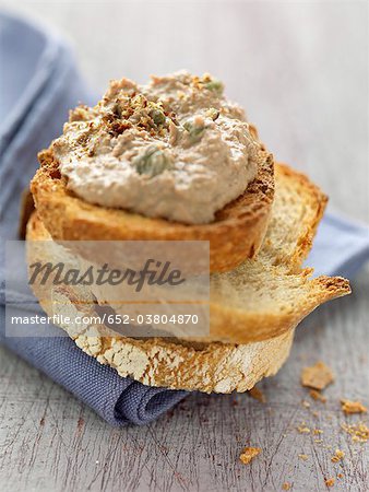 Chicken liver paté with capers on toast