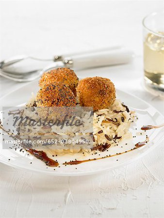 Croquettes de potiron avec blanc et riz sauvage, sauce soya et graines de pavot