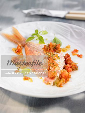 Pink seabream with tomatoes and mint