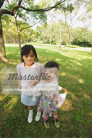 Girls Posing In Park