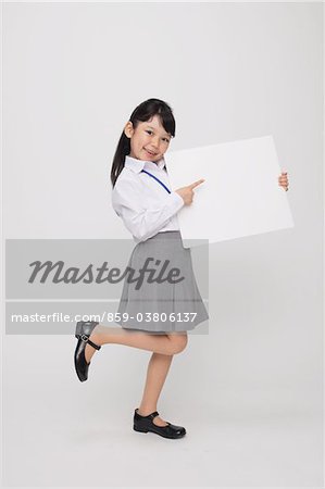Girl as Office Worker Holding Placard
