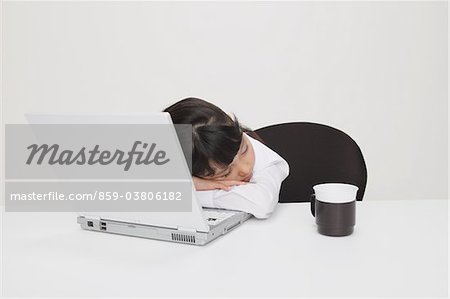 Girl as Businesswoman Sleeping In Office