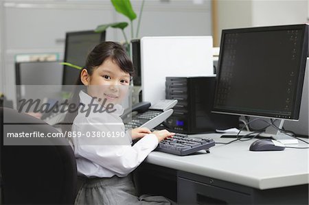 Girl as Office Worker with Computer