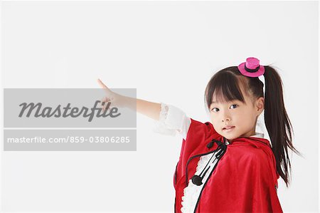 Girl Pointing Dressed In Halloween Costume